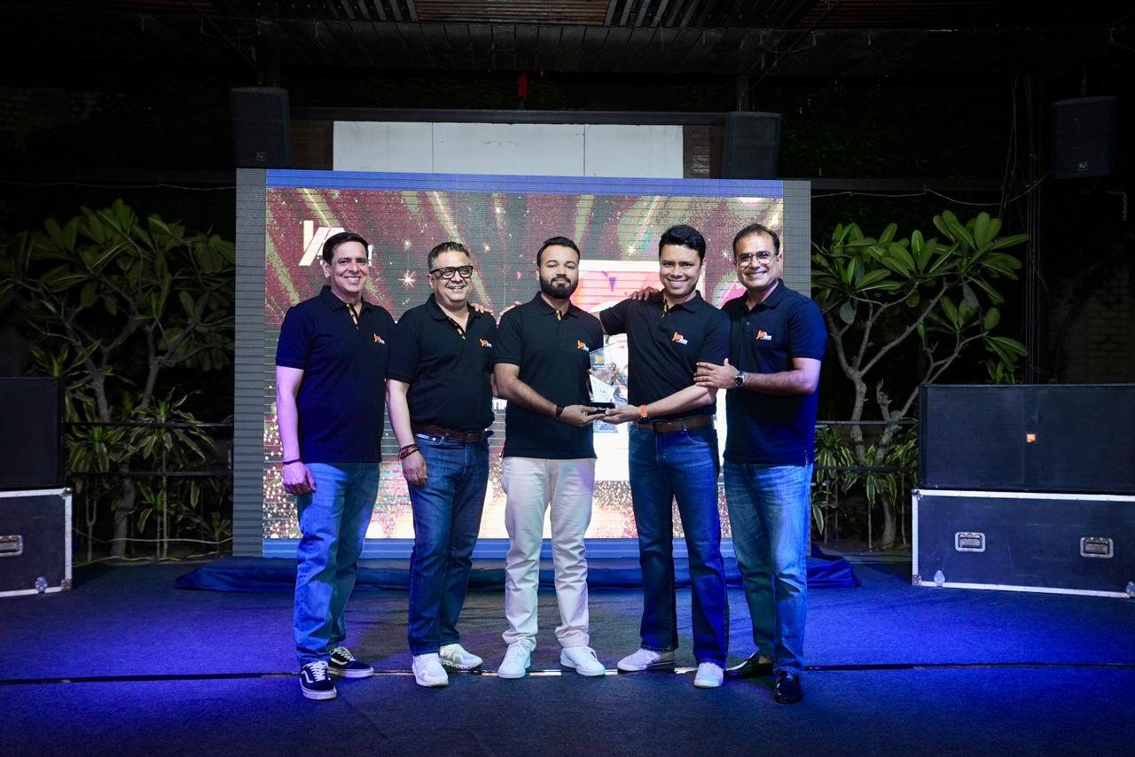 Aakash receiving an award