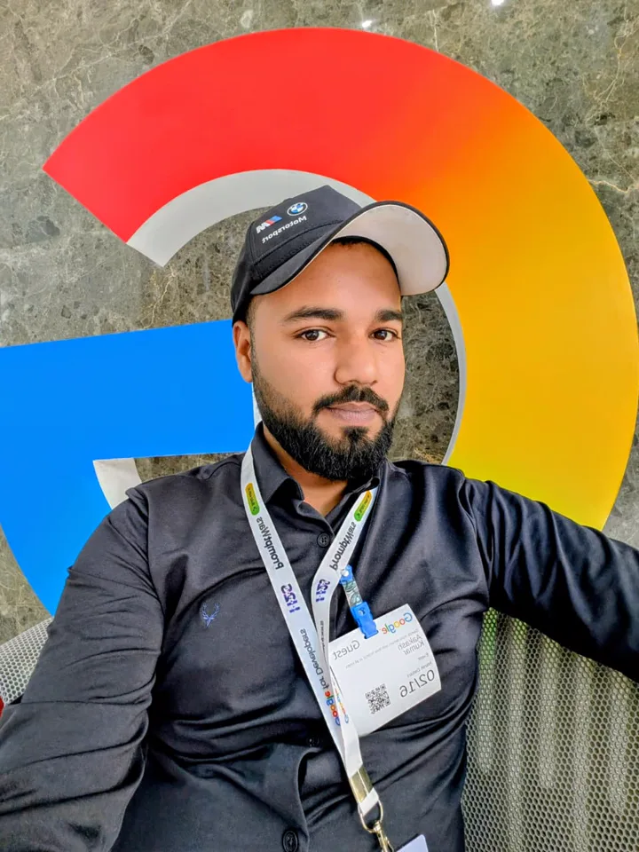 Aakash visiting Google, wearing a guest badge